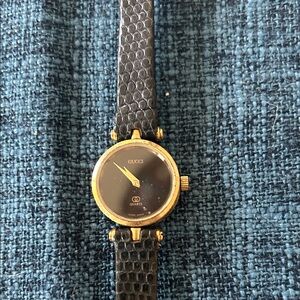 Gucci Gold and Black Leather Strap Watch